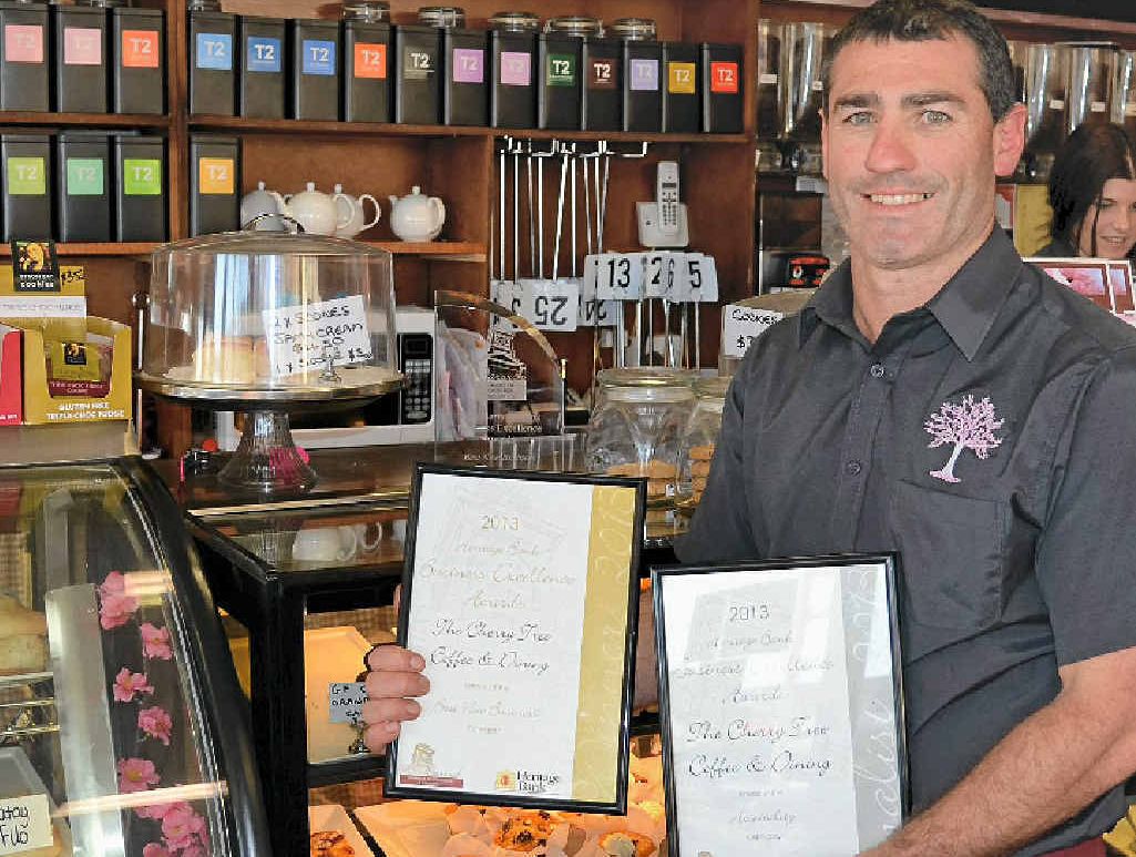 WINNING SMILE: Cherry Tree Coffee & Dining owner Scott Morton with the Best New Business awards from Saturday night. WINNING SMILE: Cherry Tree Coffee & Dining owner Scott Morton with the Best New Business awards from Saturday night.